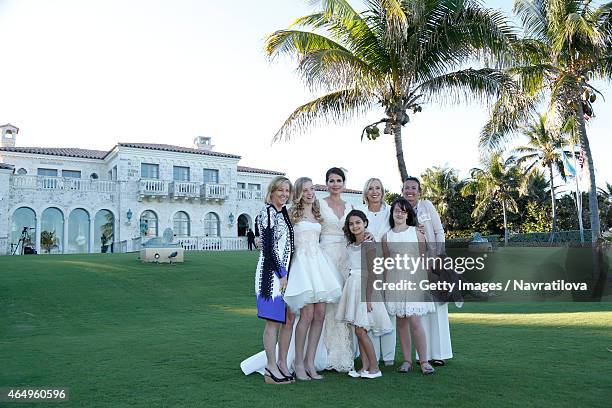 Chris Evert, Julie Lemigova, Martina Navratilova, daughters Victoria and Emma, Jana Navratilova and guest pose at the Martina Navratilova and Julie...