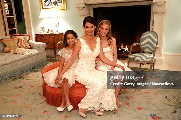 Julie Lemigova and daughters Emma and Victoria pose at the Martina Navratilova and Julie Lemigova wedding reception on February 14, 2015 in Palm...