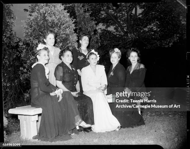 Women seated on stone bench, from left: Carrie Millan, Mrs DW Boyd, Lacy Doss, Ethel Jenkins, Florence Byrd Duke; standing: Jessie Vann and Hazel...