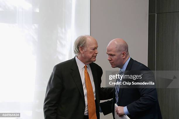 President and Chief Executive Officer of the Federal Reserve Bank of Philadelphia Charles Plosser and Peter Conti-Brown talk after participating in a...