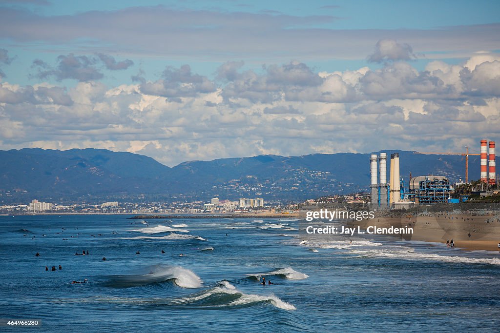 Surfers At Manhattan Beach