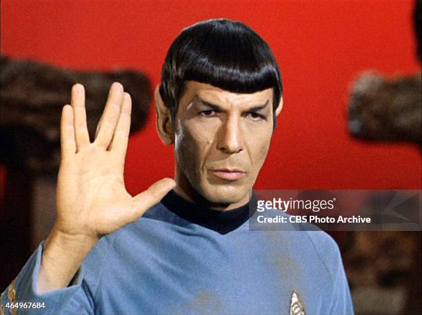 Leonard Nimoy as Mr. Spock in "Star Trek: The Original Series" episode 'Amok Time'. Spock shows the Vulcan salute, usually accompanied with the...