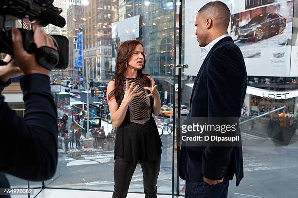 Calloway interviews Juliette Lewis during her visit to "Extra" at their New York studios at H&M in Times Square on March 2, 2015 in New York City.