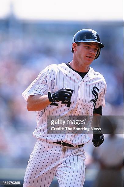 Joe Crede of the Chicago White Sox runs against the Seattle Mariners at Comiskey Park on August 11, 2002 in Chicago, Illinois.