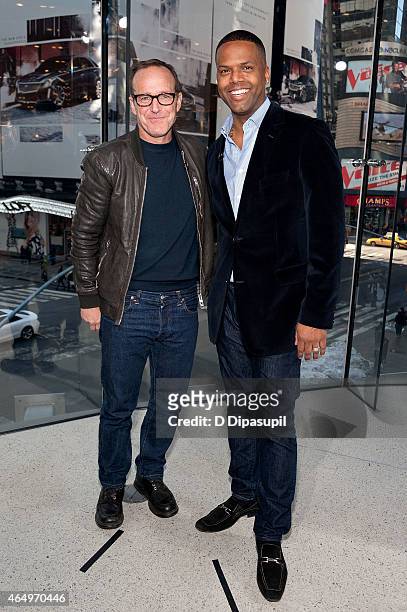 Calloway interviews Clark Gregg during his visit to "Extra" at their New York studios at H&M in Times Square on March 2, 2015 in New York City.