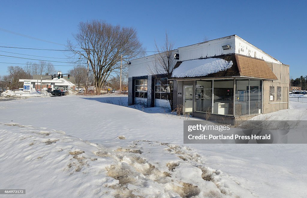 Replace this old gas station in Gorham