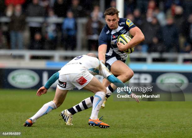 Charlie Ingall of Sale Sharks is tackled by Paul Hodgson of Worcester Warriors during the LV= Cup match between Sale Sharks and Worcester Warriors at...