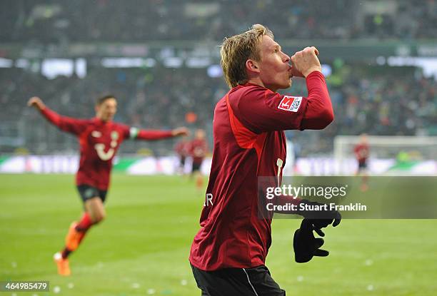 Artjoms Rudnevs of Hannover celebrates scoring his goal during the Bundesliga match between VfL Wolfsburg and Hannover 96 at Volkswagen Arena on...