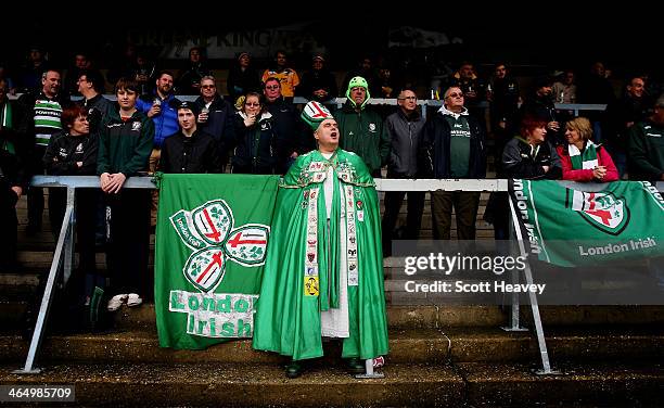 London Irish fans cheer on their team during the LV=Cup match between London Wasps and London Irish at Adams Park on January 25, 2014 in High...