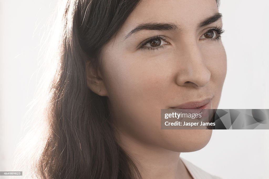 Woman's face against whiite background
