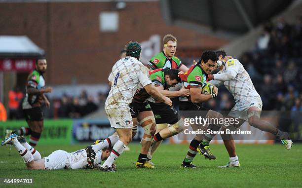 Maurie Fa'asavalu of Harlequins breaks through the Leicester Tigers defence during the LV= Cup match between Harlequins and Leicester Tigers at...