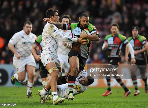 Jordan Turner-Hall of Harlequins breaks through the Leicester Tigers defence during the LV= Cup match between Harlequins and Leicester Tigers at...