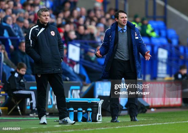 Manager Ole Gunnar Solskaer of Cardiff City and Manager Dougie Freedman of Bolton on the touchline during the FA Cup Fourth Round match between...