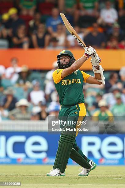 Hashim Amla of South Africa bats during the 2015 ICC Cricket World Cup match between South Africa and Ireland at Manuka Oval on March 3, 2015 in...