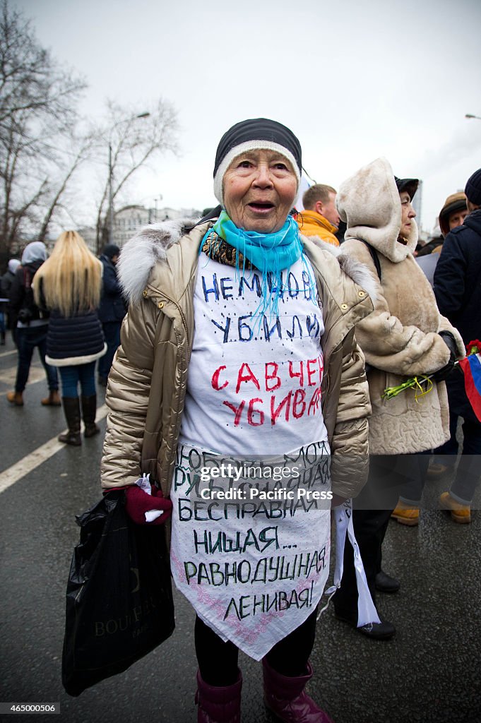 Tens of thousands marched through Moscow to honour the death...