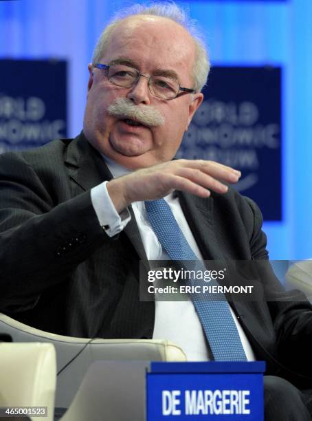 French group Total CEO Christophe de Margerie, Co-Chair of the World Economic Forum Annual Meeting 2014, attends a session in Davos on January 25,...