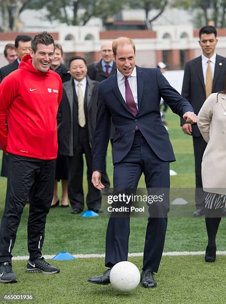 Prince William, Duke of Cambridge smiles as he attends a Premier Skills Football Event on March 3, 2015 in Shanghai, China. Prince William, Duke of...