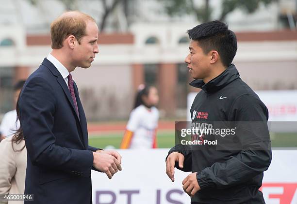 Prince William, Duke of Cambridge smiles as he attends a Premier Skills Football Event on March 3, 2015 in Shanghai, China. Prince William, Duke of...