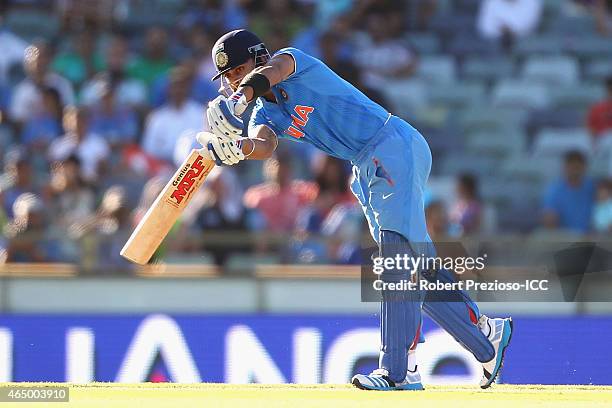 Virat Kohli of India plays a shot during the 2015 ICC Cricket World Cup match between India and the United Arab Emirates at WACA on February 28, 2015...