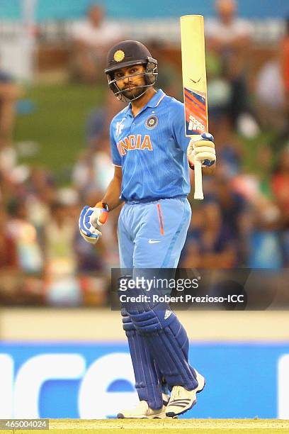 Rohit Sharma of India celebrates his half century during the 2015 ICC Cricket World Cup match between India and the United Arab Emirates at WACA on...