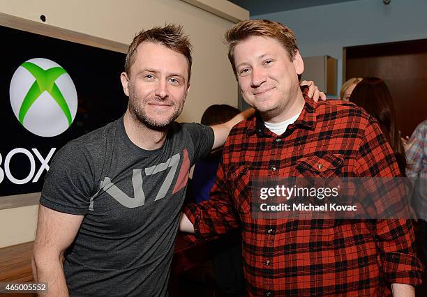 Host Chris Hardwick and Phil Larson attend the Nerdist + Xbox Live App Launch Party at Microsoft Lounge on March 2, 2015 in Venice, California.