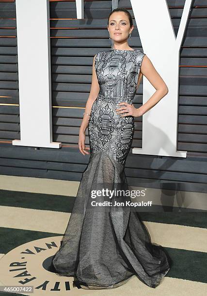 Actress Italia Ricci arrives at the 2015 Vanity Fair Oscar Party Hosted By Graydon Carter at Wallis Annenberg Center for the Performing Arts on...