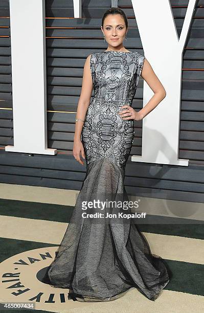 Actress Italia Ricci arrives at the 2015 Vanity Fair Oscar Party Hosted By Graydon Carter at Wallis Annenberg Center for the Performing Arts on...