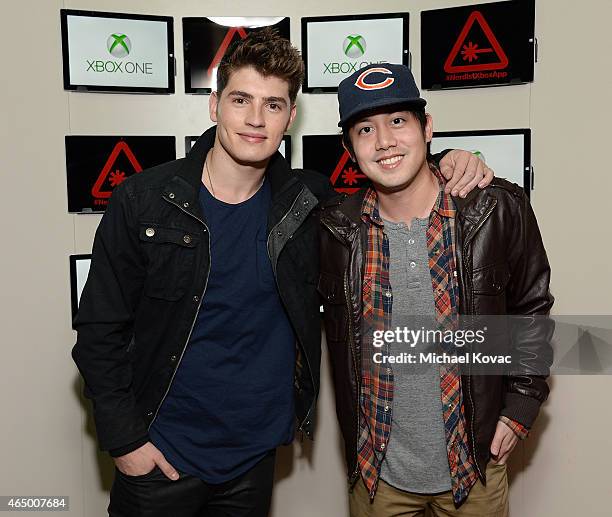 Actors Gregg Sulkin and Allen Evangelista attend the Nerdist + Xbox Live App Launch Party at Microsoft Lounge on March 2, 2015 in Venice, California.
