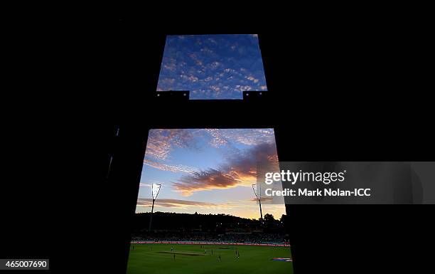 General view from the scoreboard as the sun sets over the ground during the 2015 ICC Cricket World Cup match between South Africa and Ireland at...