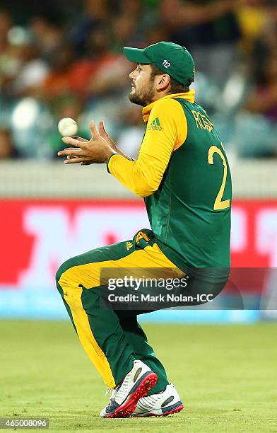 Rilee Rossouw of South Africa takes a catch in the outfield during the 2015 ICC Cricket World Cup match between South Africa and Ireland at Manuka...