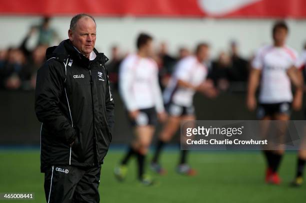 Sharks director of rugby Jake White keeps an eye on the warm up during the friendly match between Saracens and Natal Cell C Sharks at Allianz Park on...