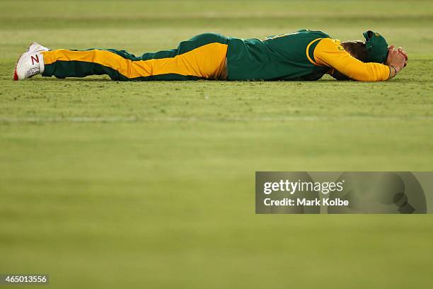 David Miller of South Africa reacts after dropping a catch during the 2015 ICC Cricket World Cup match between South Africa and Ireland at Manuka...