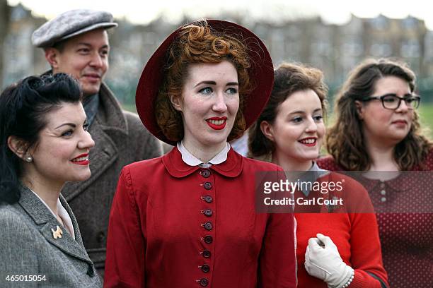 Models pose in 1940s era outfits during a photocall to highlight the forthcoming Fashion on the Ration: 1940s Street Style exhibition at the Imperial...