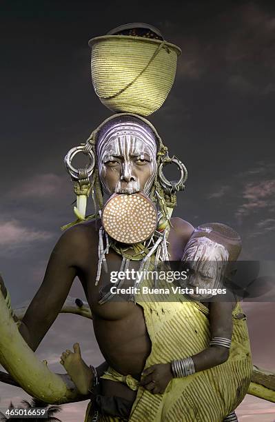 mursi tribe woman with child - mursi tribe they stock pictures, royalty-free photos & images