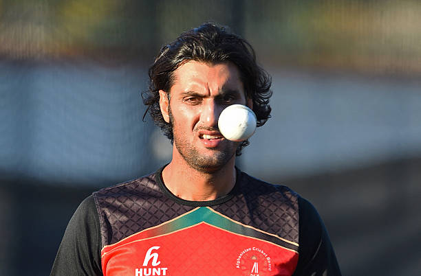 Afghanistan's Shapoor Zadran prepares to bowl during a final training session ahead of the 2015 Cricket World Cup Pool A match between Australia and...