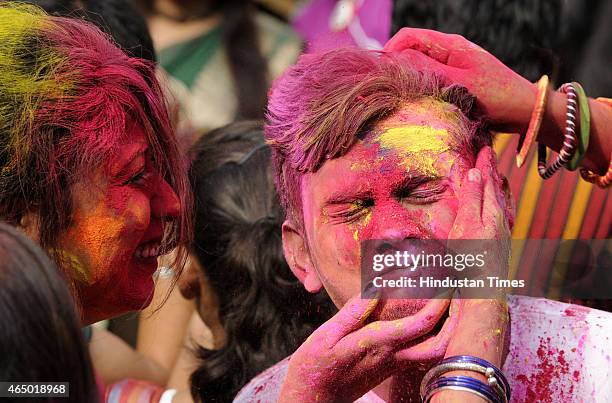 Students of Rabindra Bharati University playing colors during 'Holi' celebrations at Jorasanko Thakur Bari on March 1, 2015 in Kolkata, India. Holi...