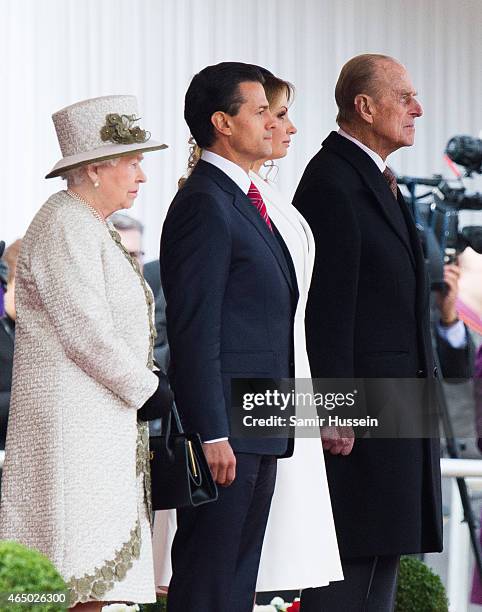 Queen Elizabeth II, Mexican President Enrique Pena Nieto, Angelica Rivera and Prince Philip, Duke of Edinburgh attend a ceremonial welcome for The...