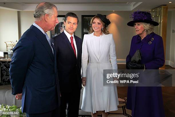 The President of Mexico Enrique Pena Nieto and First Lady Angelica Rivera meet with Prince Charles, Prince of Wales and the Duchess of Cornwall at...