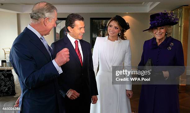 The President of Mexico Enrique Pena Nieto and First Lady Angelica Rivera meet with Prince Charles, Prince of Wales and the Duchess of Cornwall at...