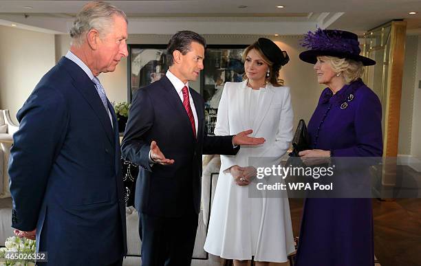 The President of Mexico Enrique Pena Nieto and First Lady Angelica Rivera meet with Prince Charles, Prince of Wales and the Duchess of Cornwall at...