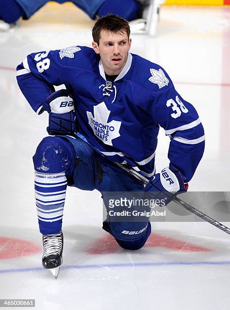 Frazer McLaren of the Toronto Maple Leafs stretches during warm up prior to NHL game action against the New Jersey Devils January 12, 2014 at the Air...