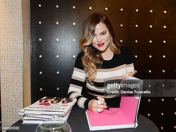 Khloe Kardashian poses for a photo at Kardashian Khaos in the Mirage Hotel and Casino on January 25, 2014 in Las Vegas, Nevada.