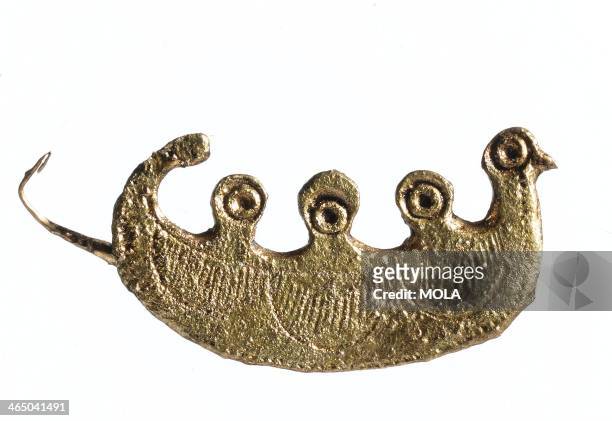 Roman copper-alloy plate brooch in the shape of a boat containing three figures, late 1st-century , found at 1 Poultry, City of London.