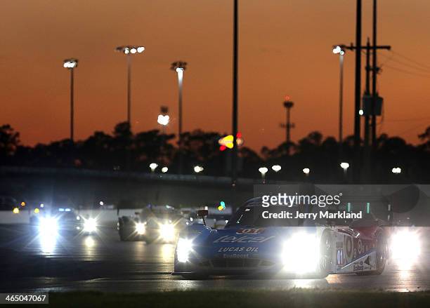 The Chip Ganassi Racing Telcel/Target Riley DP driven by Scott Pruett, Memo Rojas, Jamie McMurray and Sage Karam races during the night at the ROLEX...