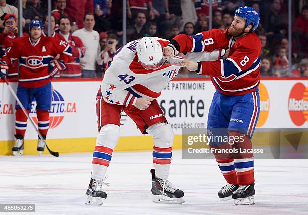 Brandon Prust of the Montreal Canadiens fights against Tom Wilson of the Washington Capitals during the NHL game on January 25, 2014 at the Bell...
