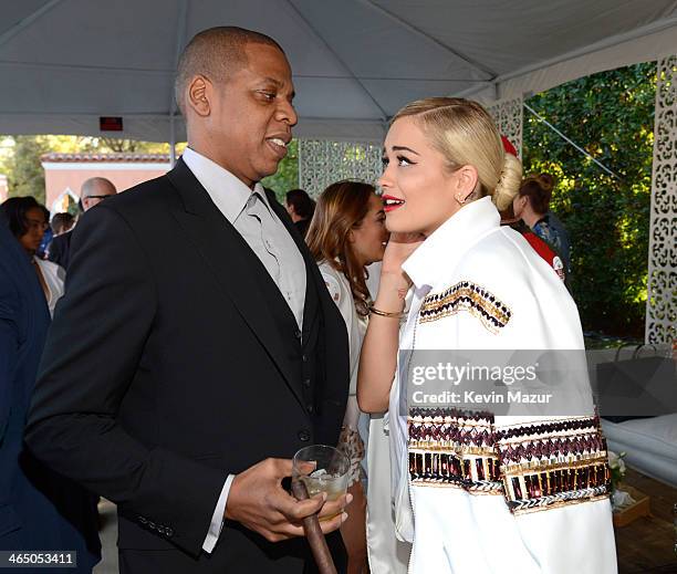 Jay-Z and Rita Ora attend the Roc Nation Pre-GRAMMY Brunch presented by MAC Viva Glam at Private Residence on January 25, 2014 in Beverly Hills,...