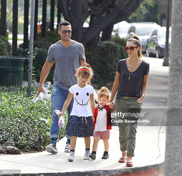 Jessica Alba and Cash Warren with daughters Haven Warren and Honor Warren are seen on January 25, 2014 in Los Angeles, California.