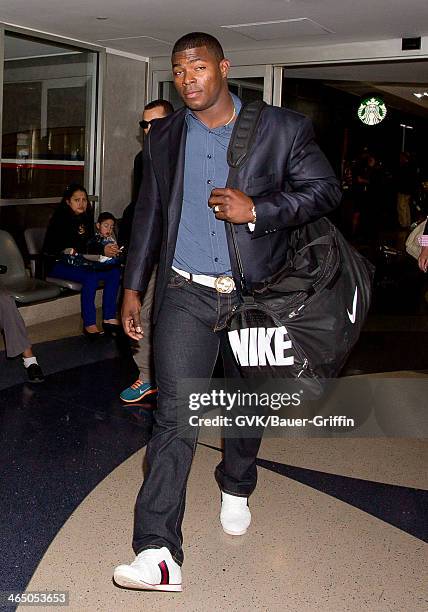 Yasiel Puig is seen at LAX airport on January 25, 2014 in Los Angeles, California.