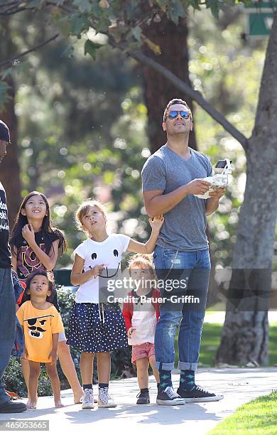 Cash Warren with daughters Haven Warren and Honor Warren are seen on January 25, 2014 in Los Angeles, California.