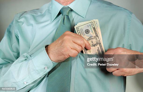 organised crime/bribe - twenty us dollar note stock pictures, royalty-free photos & images